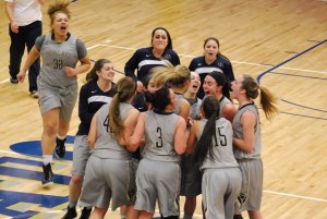 The Women’s Basketball team celebrates their February 24 victory against Franciscan – Courtesy of www.pittgreensburgathletics.com
